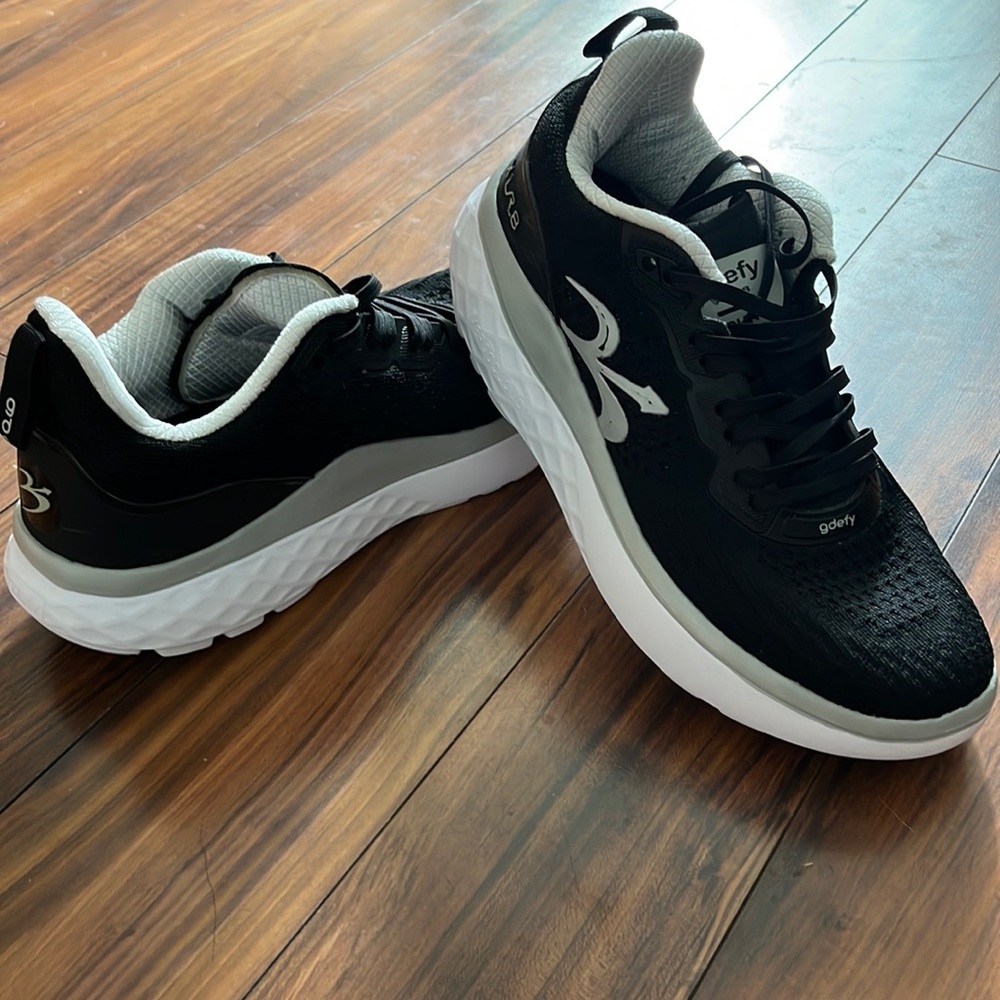 Pair of gdedy running shoes women’s size 9.5